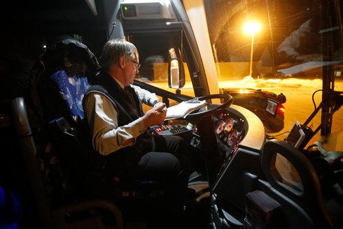 JOHN WOODS / WINNIPEG FREE PRESS
About to meet his daily driving limit Roger Hamelin, a bus driver with Beaver Bus Lines, updates his log after pulling his bus into a Portage La Prairie shopping mall lot to meet his relief driver who will take over the drive to the depot Sunday, February 24, 2019. Hamelin drove from Winnipeg to Steinbach to pick up the Steinbach Pistons and then onto Waywayseecappo where they played the Waywayseecappo Wolverines and then back to Winnipeg in what turned out to be an eighteen hour day.