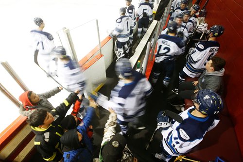 JOHN WOODS / WINNIPEG FREE PRESS
Young fans "high five" the Steinbach Pistons as they hit the ice for second period action in  Waywayseecappo Sunday, February 24, 2019. Steinbach Pistons hit the road on a bus to Waywayseecappo where they played the Waywayseecappo Wolverines and then returned to Steinbach for a 17.5 hour day.