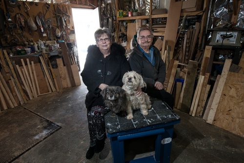 PHIL HOSSACK / WINNIPEG FREE PRESS - Jo-Ann and Lloyd Camire pose with their dogs Louis and Ginger in the workshop that they build dog houses for northern communities. See Aaron Epp's story.   - February 28, 201 9.