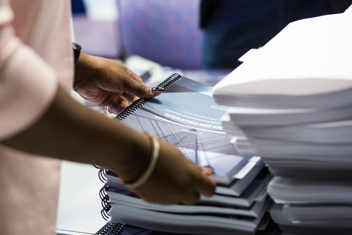 MIKAELA MACKENZIE / WINNIPEG FREE PRESS
City communication staff prep and hand out the 2019 budget at City Hall in Winnipeg on Friday, March 1, 2019. 
Winnipeg Free Press 2019.