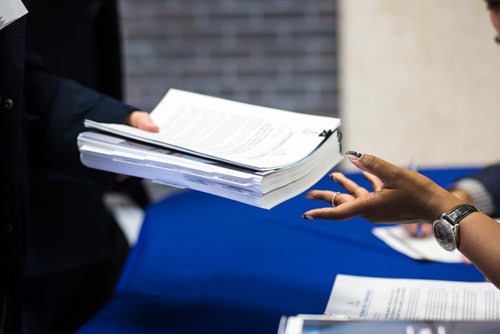 MIKAELA MACKENZIE / WINNIPEG FREE PRESS
City communication staff hand out the 2019 budget to journalists at City Hall in Winnipeg on Friday, March 1, 2019. 
Winnipeg Free Press 2019.