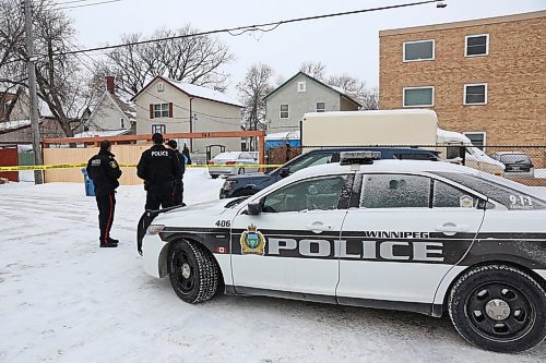MIKE DEAL / WINNIPEG FREE PRESS
Police at the scene of a critical incident on McGee Street Monday morning. Police tape surrounds two houses in the 700 block of McGee close to Notre Dame Avenue where police have been since Sunday evening. 
190304 - Monday, March 4, 2019