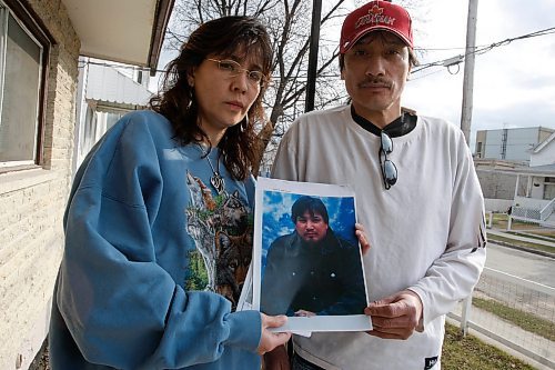 BORIS MINKEVICH / WINNIPEG FREE PRESS  090428 Gwen Wilson and her brother Dennis Bailey with a photograph of their brother Bradford Bailey who died in a house fire in Norway House.