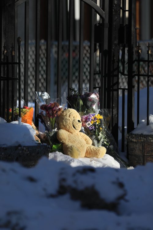 RUTH BONNEVILLE / WINNIPEG FREE PRESS

LOCAL - A memorial of flowers and a teddy bear sit on the steps  to the gate of home at 745 McGee St. where 17-year-old Jamie Adao was murdered during a home invasion Sunday night. 



March 05, 2019
