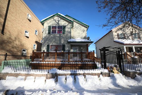 RUTH BONNEVILLE / WINNIPEG FREE PRESS
LOCAL - A memorial of flowers and a teddy bear sit on the steps to the gate of home at 745 McGee St. where 17-year-old Jamie Adao was murdered during a home invasion Sunday night.
March 05, 2019