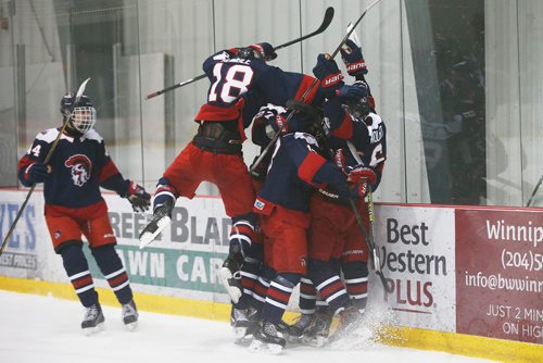 JOHN WOODS / WINNIPEG FREE PRESS
Shaftsbury Titans celebrate a go ahead goal by Mitch Wolbert (6) against the J.H. Bruns Broncos in the Winnipeg High School Hockey League Tuesday, March 5, 2019. The three game series is tied 1-1.