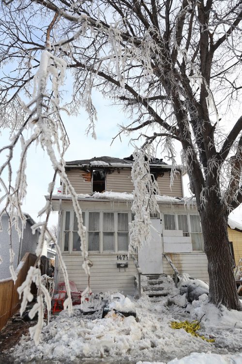 MIKE DEAL / WINNIPEG FREE PRESS
The remains of a house in the 1400 block of McDermot Avenue West destroyed by fire early Wednesday morning. 
190306 - Wednesday, March 6, 2019