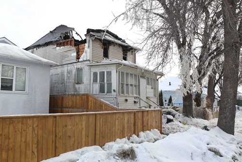 MIKE DEAL / WINNIPEG FREE PRESS
The remains of a house in the 1400 block of McDermot Avenue West destroyed by fire early Wednesday morning. 
190306 - Wednesday, March 6, 2019