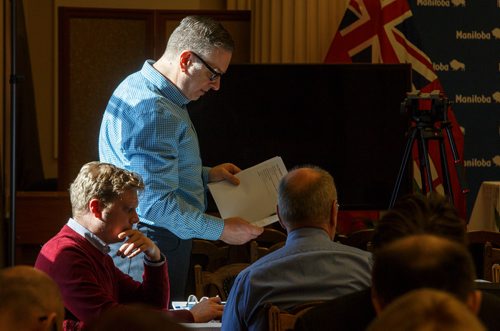 MIKE DEAL / WINNIPEG FREE PRESS
Winnipeg Free Press reporters Graeme Bruce, Dan Lett, and Larry Kusch read and discuss the 2019 Provincial Budget documents during the Media Lockup prior to the tabling of the budget in the Manitoba Legislative Chamber Thursday.
190307 - Thursday, March 07, 2019.