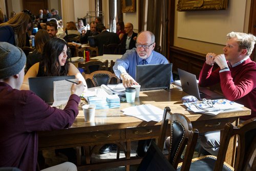 MIKE DEAL / WINNIPEG FREE PRESS
Winnipeg Free Press reporters (from left) Ryan Thorpe, Jessica Botelho-Urbanski, Larry Kusch, and Graeme Bruce read and discuss the 2019 Provincial Budget documents during the Media Lockup prior to the tabling of the budget in the Manitoba Legislative Chamber Thursday.
190307 - Thursday, March 07, 2019.