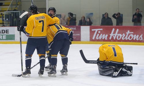 JASON HALSTEAD / WINNIPEG FREE PRESS

J.H. Bruns Collegiate Broncos players commiserate after the Shaftesbury High School Titans scored in the dying seconds to take the lead during game 3 of the Winnipeg Free Press Division Winnipeg High School Hockey League final series on March 7, 2019 at the Bell MTS Iceplex. (See Sawatzky story)