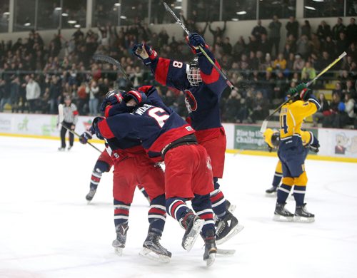 JASON HALSTEAD / WINNIPEG FREE PRESS
Shaftesbury High School Titans celebrate after Sutter Charron scored in the dying seconds to take the lead against the J.H. Bruns Collegiate Broncos during game 3 of the Winnipeg Free Press Division Winnipeg High School Hockey League final series on March 7, 2019 at the Bell MTS Iceplex. (See Sawatzky story)