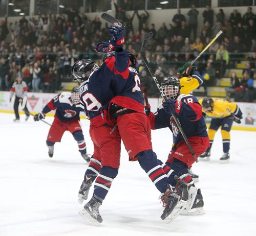 JASON HALSTEAD / WINNIPEG FREE PRESS

Shaftesbury High School Titans celebrate after Sutter Charron scored in the dying seconds to take the lead against the J.H. Bruns Collegiate Broncos  during game 3 of the Winnipeg Free Press Division Winnipeg High School Hockey League final series on March 7, 2019 at the Bell MTS Iceplex. (See Sawatzky story)