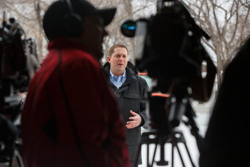 MIKE DEAL / WINNIPEG FREE PRESS
Federal Conservative Party Leader, Andrew Scheer with Gordon Grenkow on his family farm near Winnipeg, MB, speaks to the media regarding his plan to remove the GST from home heating and energy bills if his party is elected.
190308 - Friday, March 08, 2019.