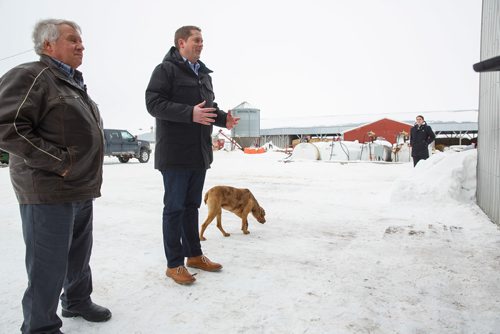 MIKE DEAL / WINNIPEG FREE PRESS
Federal Conservative Party Leader, Andrew Scheer with Gordon Grenkow on his family farm near Winnipeg, MB, speaks to the media regarding his plan to remove the GST from home heating and energy bills if his party is elected.
190308 - Friday, March 08, 2019.