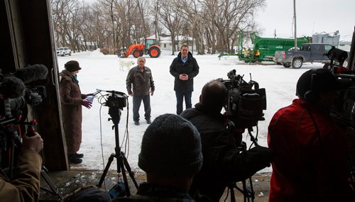 MIKE DEAL / WINNIPEG FREE PRESS
Federal Conservative Party Leader, Andrew Scheer with Gordon Grenkow on his family farm near Winnipeg, MB, speaks to the media regarding his plan to remove the GST from home heating and energy bills if his party is elected.
190308 - Friday, March 08, 2019.