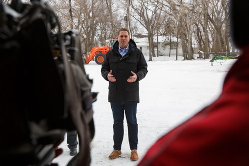 MIKE DEAL / WINNIPEG FREE PRESS
Federal Conservative Party Leader, Andrew Scheer with Gordon Grenkow on his family farm near Winnipeg, MB, speaks to the media regarding his plan to remove the GST from home heating and energy bills if his party is elected.
190308 - Friday, March 08, 2019.