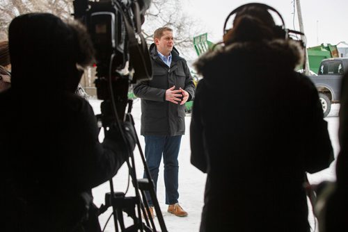 MIKE DEAL / WINNIPEG FREE PRESS
Federal Conservative Party Leader, Andrew Scheer with Gordon Grenkow on his family farm near Winnipeg, MB, speaks to the media regarding his plan to remove the GST from home heating and energy bills if his party is elected.
190308 - Friday, March 08, 2019.