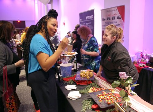 JASON HALSTEAD / WINNIPEG FREE PRESS

Resto Gare chef Melissa Makarenko (right) serves up canapés to Women's Health Clinic board member Adeline Bird at the Women, Wine and Food fundraiser for the Women's Health Clinic on International Womens Day on March 8, 2019 in Alloway Hall at Manitoba Museum. (See Social Page)
