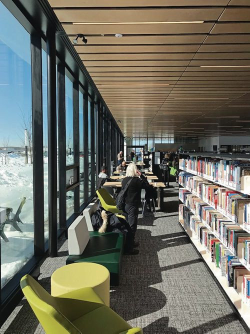 Canstar Community News The interior of the nearly 14,000 square foot Transcona Library features an accessible open concept with floor to ceiling windows along the south and north walls. (SHELDON BIRNIE/CANSTAR/THE HERALD)