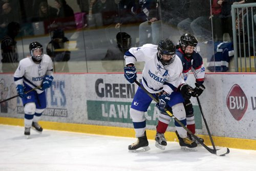 PHIL HOSSACK / WINNIPEG FREE PRESS - Selkirk Royals #7 Jazmyn-Rae Desjarlais heads off St Marys Academy #7 Jenny Kim (right) in playoff action at the IcePlex Monday afternoon. Sawatzky's story.  -  March 11, 2019.