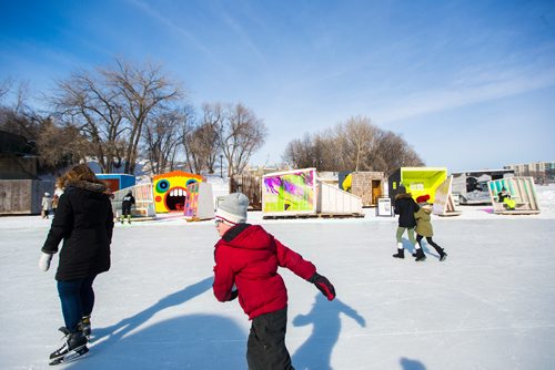 MIKAELA MACKENZIE / WINNIPEG FREE PRESS
Folks skate and take a look at the warming huts, which are all gathered together on the river trail, at the Forks in Winnipeg on Monday, March 11, 2019. 
Winnipeg Free Press 2019.