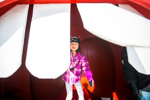 MIKAELA MACKENZIE / WINNIPEG FREE PRESS
Hazel Pancoe, five, checks out the warming huts, which are all gathered together on the river trail, at the Forks in Winnipeg on Monday, March 11, 2019. 
Winnipeg Free Press 2019.