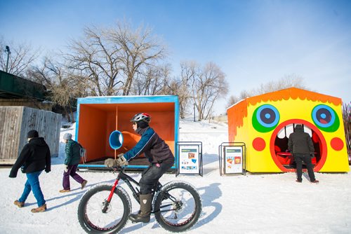 MIKAELA MACKENZIE / WINNIPEG FREE PRESS
Folks skate, walk, bike, and take a look at the warming huts, which are all gathered together on the river trail, at the Forks in Winnipeg on Monday, March 11, 2019. 
Winnipeg Free Press 2019.