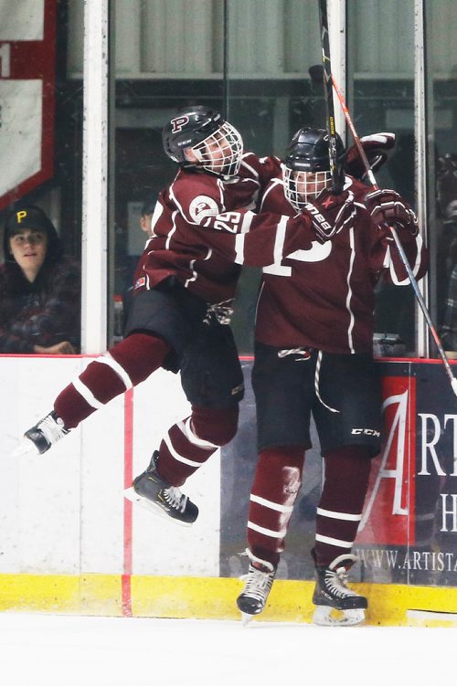JOHN WOODS / WINNIPEG FREE PRESS
St Paul's High School  Jack Kaiser (21), right, and Michael Tanchak (29) celebrate Kaiser's goal against the Sturgeon Heights Huskies in the AAAA Provincial High School Championships Monday, March 11, 2019.