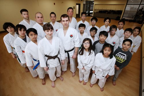 JOHN WOODS / WINNIPEG FREE PRESS
Front centre, Margaret Eve MacKinnon, Sempei and Program and Development assistant for MacKinnon's Y-Not? Anti-Poverty Program, and Alan Taylor, Sensei, are photographed with their karate class at the University of Winnipeg's Duckworth Centre Monday, March 11, 2019.