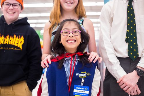 MIKAELA MACKENZIE / WINNIPEG FREE PRESS
Gianna Eusebio, 10, smiles in a group picture with previous years' champions after being crowned 2019 Champion Child for the Children's Hospital Foundation of Manitoba at the Walmart Winnipeg South Super Centre in Winnipeg on Tuesday, March 12, 2019. 
Winnipeg Free Press 2019.