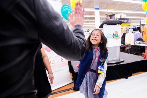 MIKAELA MACKENZIE / WINNIPEG FREE PRESS
Gianna Eusebio gets high fives all around after being crowned 2019 Champion Child for the Children's Hospital Foundation of Manitoba at the Walmart Winnipeg South Super Centre in Winnipeg on Tuesday, March 12, 2019. 
Winnipeg Free Press 2019.