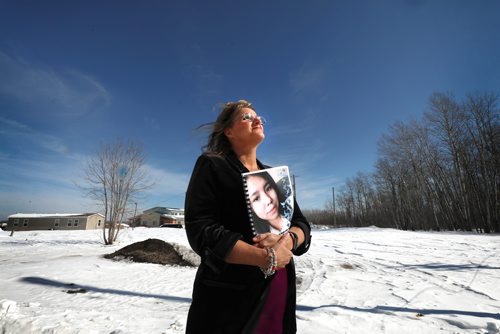 
RUTH BONNEVILLE / WINNIPEG FREE PRESS

Portrait of Daphne Penrose with the Manitoba Advocate for Children and Youth (who put together the report for the investigation into the death of Tina Fontaine), stands outside the  Sagkeeng Mino Pimatiziwin Family Treatment Centre in Sagkeeng First Nation while she holds the report in her arms after it was released to the press  in Sagkeeng First Nation Tuesday. 



March 12,, 2019
