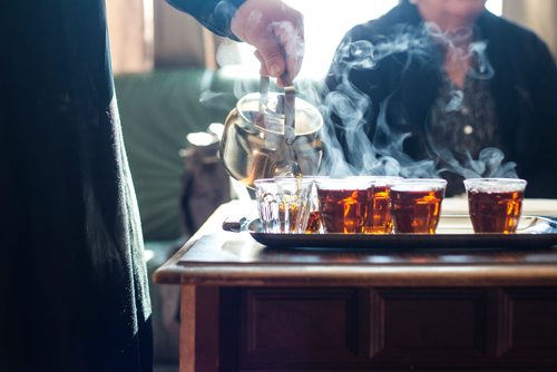 MIKAELA MACKENZIE / WINNIPEG FREE PRESS
Badyra Humsi pours tea for her friends and family at the Humsi family home in Winnipeg on Tuesday, March 12, 2019. The two families met through a Volunteer Matching Program with the Manitoba Interfaith Immigration Council that pairs Canadians up with newcomers.
Winnipeg Free Press 2019.