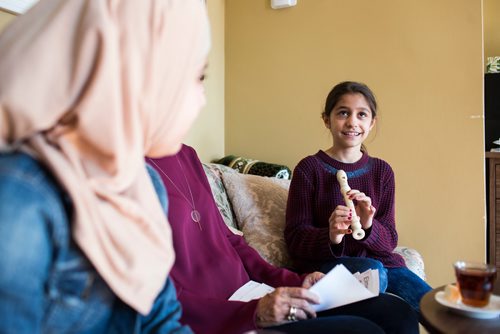 MIKAELA MACKENZIE / WINNIPEG FREE PRESS
Ghena Humsi, nine, plays her recorder for friends and family at the Humsi family home in Winnipeg on Tuesday, March 12, 2019. The two families met through a Volunteer Matching Program with the Manitoba Interfaith Immigration Council that pairs Canadians up with newcomers.
Winnipeg Free Press 2019.