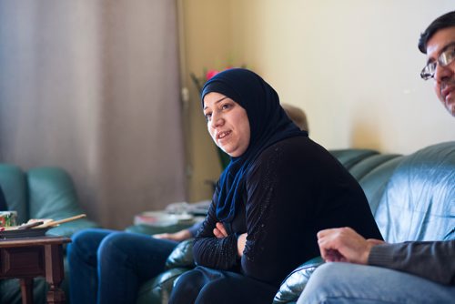 MIKAELA MACKENZIE / WINNIPEG FREE PRESS
Badyra Humsi talks to friends and family at the Humsi family home in Winnipeg on Tuesday, March 12, 2019. The two families met through a Volunteer Matching Program with the Manitoba Interfaith Immigration Council that pairs Canadians up with newcomers.
Winnipeg Free Press 2019.