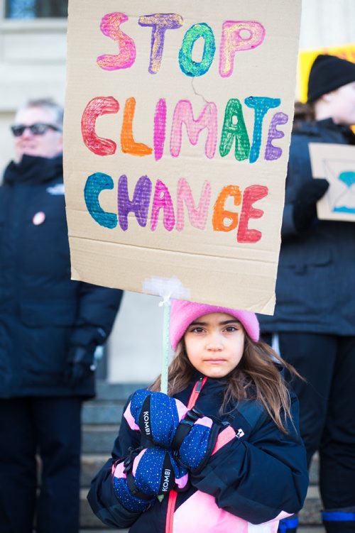 MIKAELA MACKENZIE / WINNIPEG FREE PRESS
Anna Milne-Karn, seven, attends a funeral for the planet at the Manitoba Legislative Building in Winnipeg on Friday, March 15, 2019. 
Winnipeg Free Press 2019.