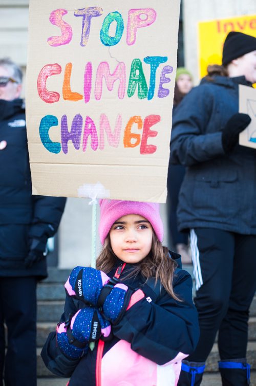 MIKAELA MACKENZIE / WINNIPEG FREE PRESS
Anna Milne-Karn, seven, attends a funeral for the planet at the Manitoba Legislative Building in Winnipeg on Friday, March 15, 2019. 
Winnipeg Free Press 2019.