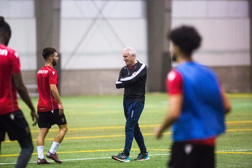 MIKAELA MACKENZIE / WINNIPEG FREE PRESS
Technical consultant John Peacock, a new addition to the Valour FC coaching staff, watches practice at the Subway South Soccer Complex in Winnipeg on Monday, March 18, 2019. 
Winnipeg Free Press 2019.