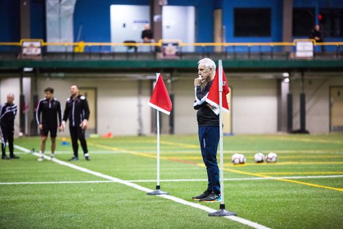 MIKAELA MACKENZIE / WINNIPEG FREE PRESS
Technical consultant John Peacock, a new addition to the Valour FC coaching staff, watches practice at the Subway South Soccer Complex in Winnipeg on Monday, March 18, 2019. 
Winnipeg Free Press 2019.