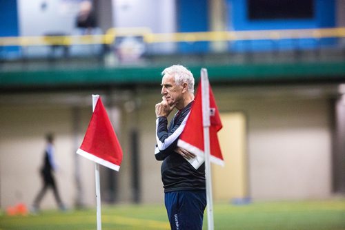 MIKAELA MACKENZIE / WINNIPEG FREE PRESS
Technical consultant John Peacock, a new addition to the Valour FC coaching staff, watches practice at the Subway South Soccer Complex in Winnipeg on Monday, March 18, 2019. 
Winnipeg Free Press 2019.