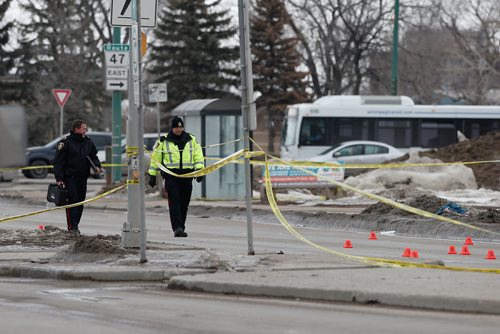 JOHN WOODS / WINNIPEG FREE PRESS
The crosswalk at Isabel and Alexander is closed as police investigate after a vehicle hit a pedestrian in Winnipeg Monday, March 18, 2019.
