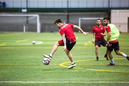 MIKAELA MACKENZIE / WINNIPEG FREE PRESS
Technical consultant John Peacock, a new addition to the Valour FC coaching staff, watches practice at the Subway South Soccer Complex in Winnipeg on Monday, March 18, 2019. 
Winnipeg Free Press 2019.