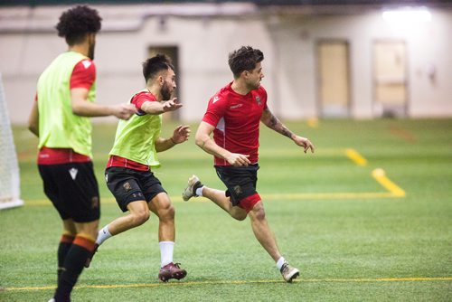 MIKAELA MACKENZIE / WINNIPEG FREE PRESS
Technical consultant John Peacock, a new addition to the Valour FC coaching staff, watches practice at the Subway South Soccer Complex in Winnipeg on Monday, March 18, 2019. 
Winnipeg Free Press 2019.