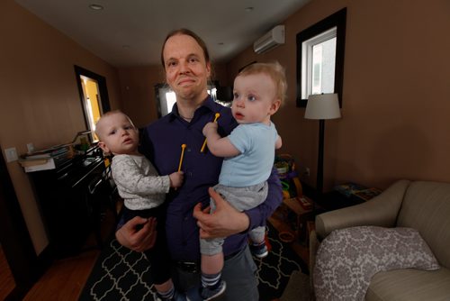 PHIL HOSSACK / WINNIPEG FREE PRESS - Travis Tomchuk and his twin sons Émile (left) and Anton at home Tuesday. See Jen Zoratti's story re Paternal Leave. - March19, 2019.