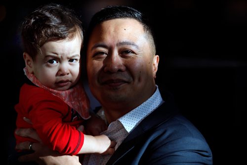 PHIL HOSSACK / WINNIPEG FREE PRESS - Paul Lacap and his son Nate pose at the Forks Market Tuesday. See Jen Zoratti's story re Paternal Leave. - March19, 2019.