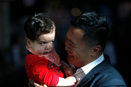 PHIL HOSSACK / WINNIPEG FREE PRESS - Paul Lacap and his son Nate pose at the Forks Market Tuesday. See Jen Zoratti's story re Paternal Leave. - March19, 2019.