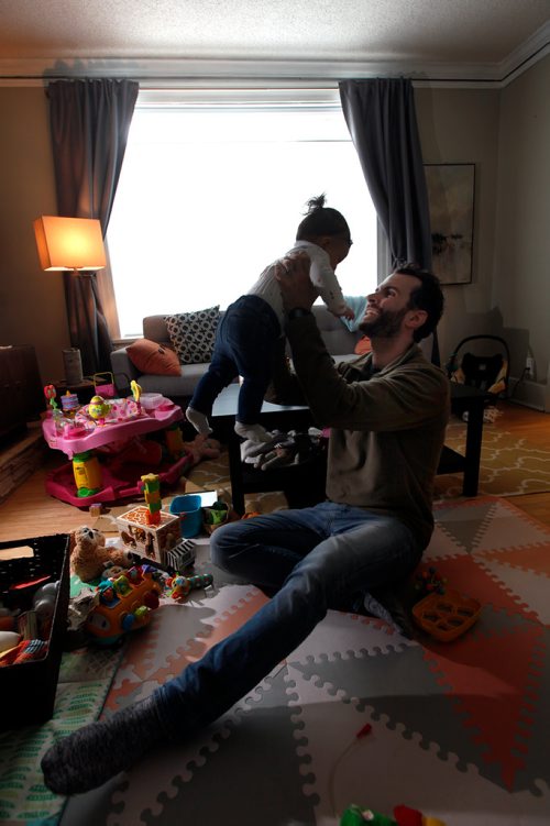 PHIL HOSSACK / WINNIPEG FREE PRESS - Jason Carkner and his daughter June at home Tuesday. See Jen Zoratti's story re Paternal Leave. - March19, 2019. 

**Jason didn't want to have June's face or ID shown in the photos....he's seen and OK'd everything I entered to Merlin.