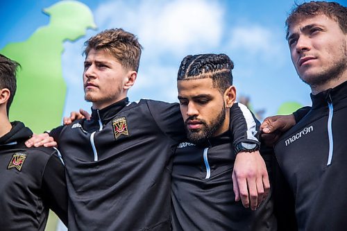 MIKAELA MACKENZIE / WINNIPEG FREE PRESS
Valour FC players Tyler Attardo (left), Federico Pena, and Calum Ferguson huddle while visiting the Valour Road Commemorative Plaza to learn about the inspiration and naming of Valour FC in Winnipeg on Wednesday, March 20, 2019.
Winnipeg Free Press 2019.