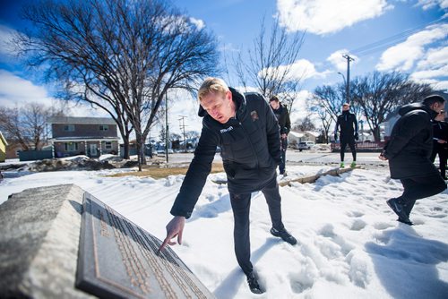 MIKAELA MACKENZIE / WINNIPEG FREE PRESS
Valour FC coach Rob Gale reads the placard while visiting the Valour Road Commemorative Plaza to learn about the inspiration and naming of Valour FC in Winnipeg on Wednesday, March 20, 2019. 
Winnipeg Free Press 2019.